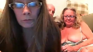Mature bearded guy teased by 2 women on the couch