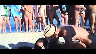 Lustful amateur swingers indulge in group sex on the beach