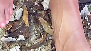 Step-mommy Shows off Her Feet While Outdoors
