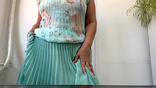 I'm horny again at the office and I lift my skirt and show my tits in public.