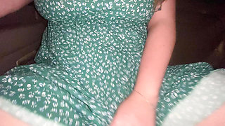 Having fun in the back seat of a taxi while the driver is not looking. Fucking herself with her fingers in the car. Public amateur
