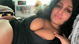 Busty curly brunette with big boobs fucks on couch