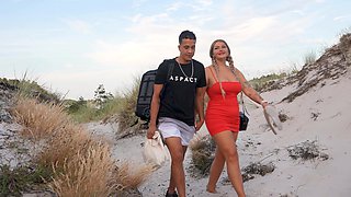 Couple has sex on the beach with a beautiful view
