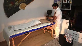 Hidden camera in massage parlor - Chubby masseur fucks client