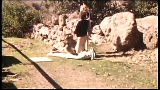 Vintage porn: two young whores outdoor fucking with John Holmes's cock