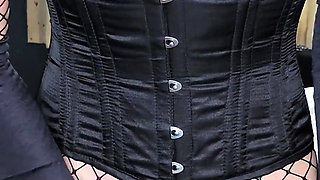 Fishnet body stocking, satin gloves and underbust corset