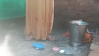 School girl Desi villge girl bathing outdoor leaked mms real desi girl big boobs cute innocent girl viral HD nude video