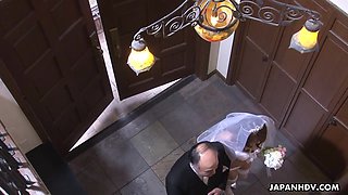 Amateur Asian bride gives a blowjob at the altar