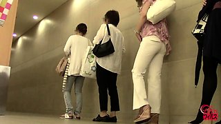 Lovely amateur Japanese babes pissing on hidden toilet cam