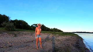 Russian Nudist on the River Shore