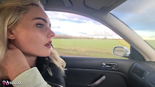 A fair-haired female traveler accepted a ride and subsequently engaged in a provocative sexual encounter within the veh