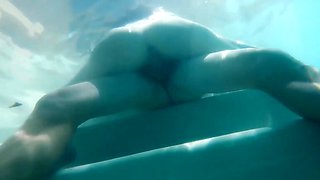 Underwater fuck with a big boobs brunette babe