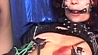Bound Redhead MILF Overwhelmed by Toys and Tongues