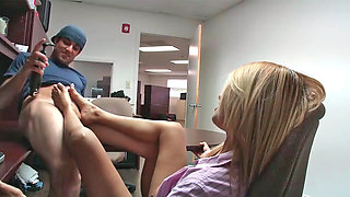 Experienced blonde Penelove gives a hot footjob to a hot guy