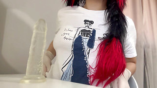 I play with the dildo in tight, white medical gloves