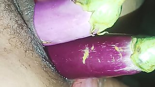 Sister-in-law put two brinjals and cock in her pussy simultaneously