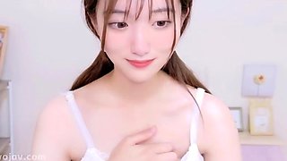 A Fair-skinned, Innocent Girl With Black Hair Who Shows