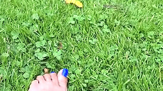 Melove Blue Nail Polish Showing her sexy feet on Grass