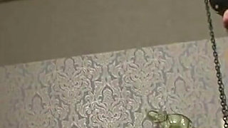 Humiliated chaining and penis squeezing