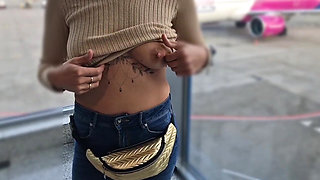Flashing Her Tits in at the Airport, Showing Her Tits to Everyone