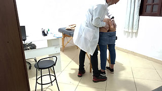 Proctologist performs anal exam on constipated patient.