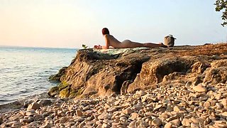 Redhead Mira Love Gets Sunscreen and a Hard Fuck on Nudist Beach
