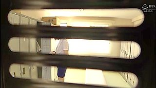 An office lady takes off her bra and masturbates by placing a vibrator over her pantyhose.