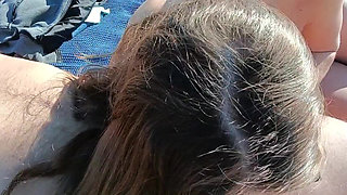 stepdaughter blows stepfather on a nudist beach