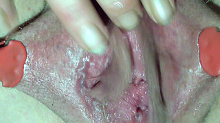 Girl Plays with Her Spread Pussy and Pees