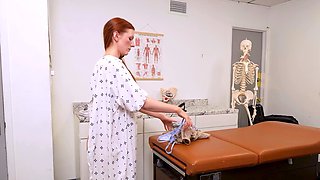 Doctor Examines Naked Brunette on Table